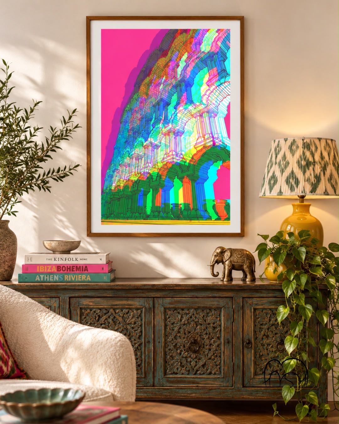 Digital artwork by Harshi Agarwal of colourful layered arches on pink, framed on a wall