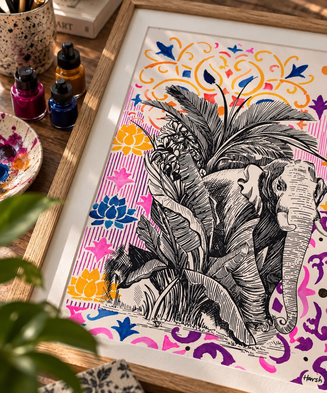 Pen and ink elephant among palm leaves with coloured motifs, in Harshi Agarwal's studio